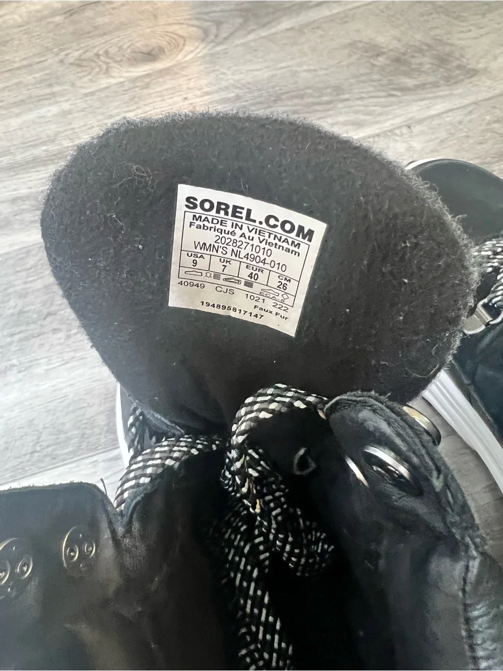 Sorel Black Lace-Up Winter Boots with White Accents